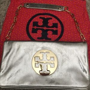 Tory Burch gold clutch